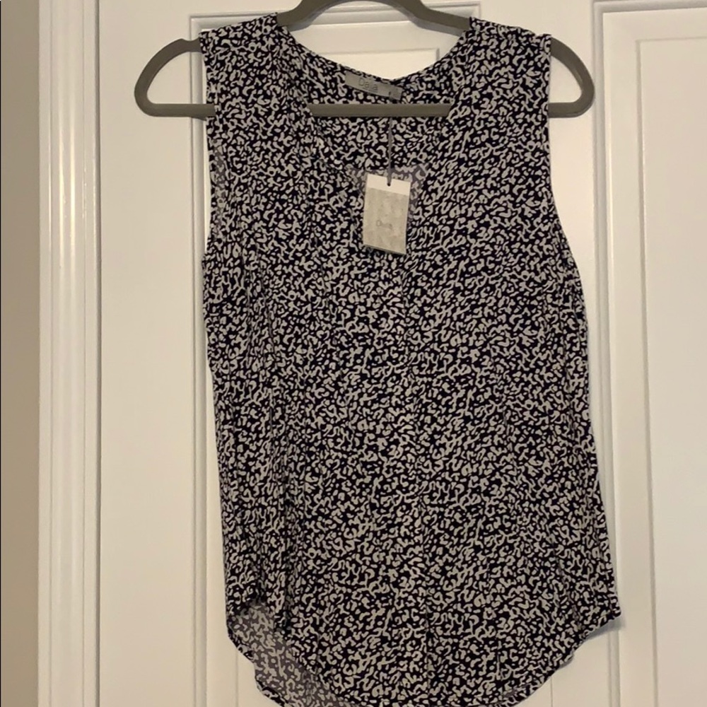 Dalia sleeveless navy and white shirt